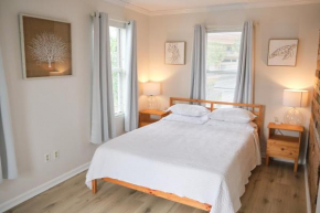 Two Bedrooms - Walk to the Beach!